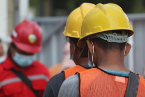 Construction workers in Yellow hard hats